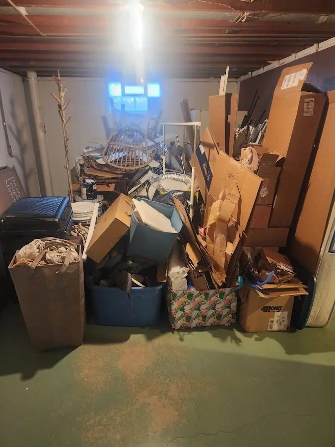 Roll-off dumpster container at job site for 15 Yard Dumpster Rental in Fulton